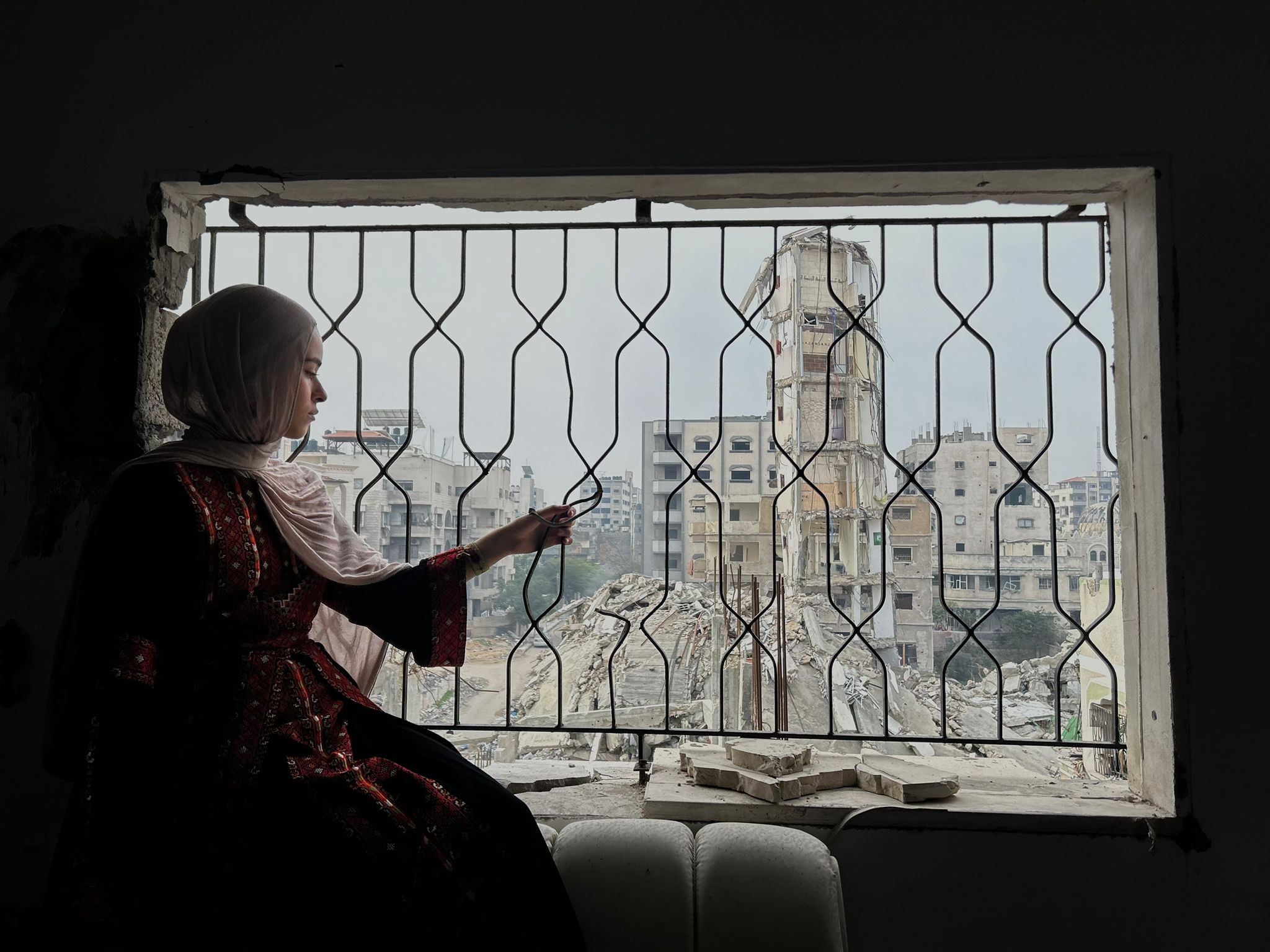 Gaza 40 student starting anxiously into the war torn land